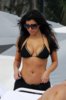 Kim_Kardashian_in_bikini_on_the_beach_at_the_newly_opened_Fontainebleau_Hotel_01.jpg