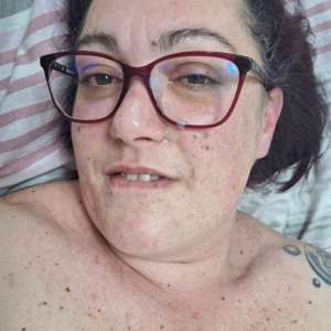Horny wife shows off herself with cum on face and glasses