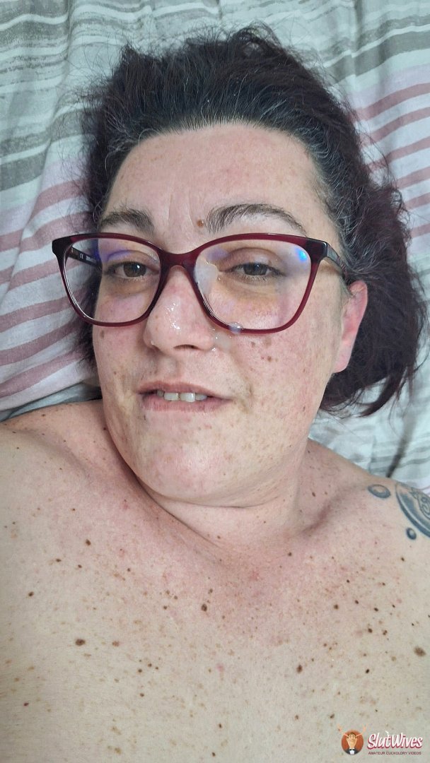 Horny wife shows off herself with cum on face and glasses