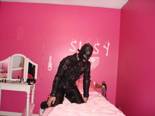 me in a leather gimp slave suit