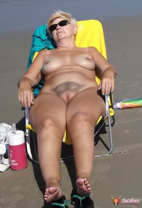 Sandy Tanning On A Nude Beach.jpg