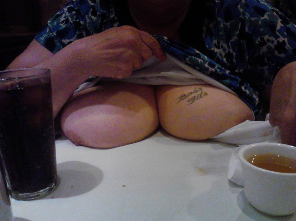Showing naked TiTs and nipples in a Chinese resturant